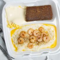 Shrimp Omelet · Served with three eggs, home fries or grits and buttered toast.