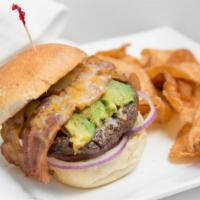 California Burger · Topped with fresh avocado, bacon, red onions and cheddar jack cheese, with guacamole on the ...
