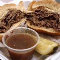 French Dip · Hot roast beef au jus with fried onions and provolone cheese on a long roll.