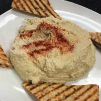Hummus Platter · Homemade hummus with toasted pita bread.