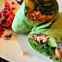 Grilled Salmon Wrap · Blackened salmon, avocado spread, red onion, romaine and cherry tomatoes.