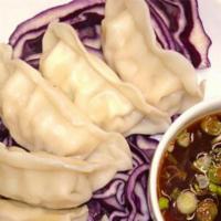Vegetable Dumplings · Assorted vegetables in a dumpling wrapper served with ginger sauce. Your choice of steamed o...