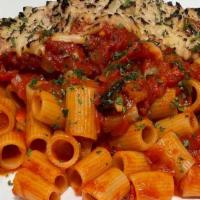 Vegan Chicken Parmigiana · vegan chicken cutlet, mezze maniche , pomodoro sauce , vegan mozzarella