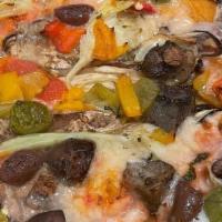 Vegan  Stagioni · tomato san marzano sauce , vegan mozzarella , olives , artichoke , roasted mushrooms, roaste...