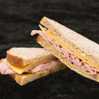 Ham & Cheese · Thinly Sliced Ham with white American Cheese on your Choice of Bread