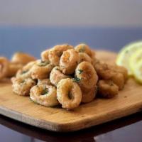 Fried Calamari · Lightly breaded calamari, tender in the inside and crispy fried to golden brown perfection s...