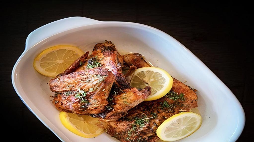 1/2 Baked Chicken With 2 Sides · Tender, full flavored, the juiciest baked chicken, served with two side dishes and choice of bread on the side.