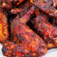 5 Bbq Chicken Wings With 2 Sides · Five pieces. Tender, full flavored, the juiciest BBQ chicken wings, served with two side dis...