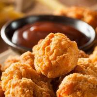 Popcorn Chicken (With Dipping Sauce) · Popcorn sized chunks of our fried chicken. Served with house or buffalo style dipping sauce.