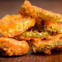 Fried Pickles (With Dipping Sauce) · House breaded. Served with house dipping sauce.