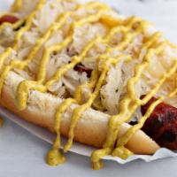 New Yorker · Beef hot dog topped with sauerkraut and spicy brown mustard.