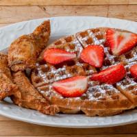 Waffles & Chicken  · Served with 1 large waffle, 3 pieces of chicken & fresh, cut strawberries