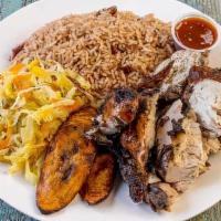 Medium Jerk Chicken Platter · Each platter consists of meat, rice, and your choice of any 2 sides: mac and cheese, cabbage...