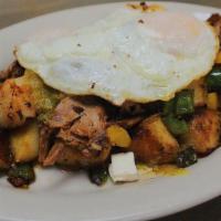 Carnitas Skillet · Gluten free. Braised pork shoulder, home fries, bell peppers, onions, green salsa and queso ...