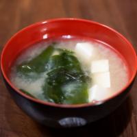 Miso Soup · Dashi cooking stock and miso paste broth with wakame and tofu.