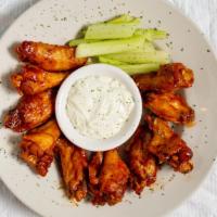 Bucket Of Wings (50Pc) · Plain, mild, hot, hot honey, or buffalo sauce. Served with celery sticks and blue cheese dre...