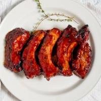 Chicken & Rib Platters (Rib & Leg Combo) · With two sides. Three ribs (baby or spare) and three chicken pieces.