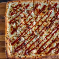 Bbq Chicken Pizza · White pizza with grilled chicken, BBQ sauce, and mozzarella cheese.