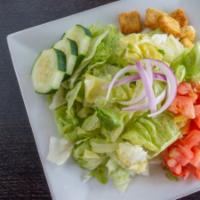 Side Garden Salad · Fresh mixed greens with tomatoes, red onions, and cucumbers  with your choice of dressing.