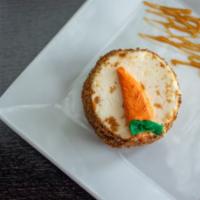 Carrot Cake · Sweet and moist spice cake, full of cut carrots and toasted nuts, and covered in cream chees...