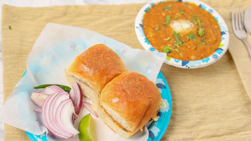 Pav (2) Bhaji · Vegetarian. Special mixed veggies mixed with homemade spices. Served with special kind of bread (pav).