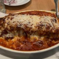 Lasagna · Lasagna, made from scratch, topped with our meat sauce and mozzarella. Add meatballs or Ital...