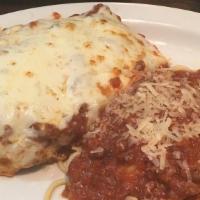 Veal Parmesan · Veal that is breaded with Parmesan cheese and then baked with mozzarella and our meat sauce....