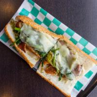Frank Rizzo · Cutlet topped with Broccoli Rabe & Sharp Provolone topped with Long Hots.