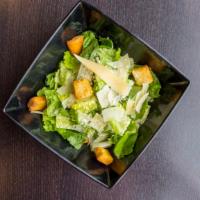 Caesar Salad · Romaine, Croutons & Shaved Parmesan.