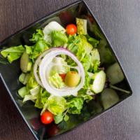 Garden Salad · Mixture of Romaine & Iceberg Lettuce, Tomatoes, Cucumbers, Onions & Green Olives.