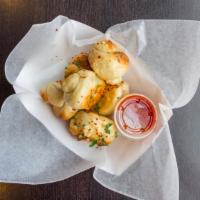 Garlic Knots (6) · Our delicious garlic knots made fresh daily from our special dough.  Baked to a golden brown...