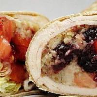 Thanksgiving Turkey · Turkey breast, stuffing, cranberry sauce, mayo, lettuce, and tomato on a wrap or sub.