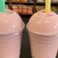 Real Fruit Smoothies · Made with plain yogurt, sugar, milk, and ice.
Additional charge for non dairy smoothies, 
ex...