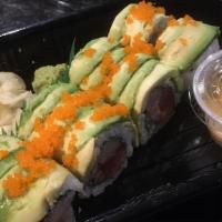 Three Musketeers · Tuna, salmon, yellowtail. Inside: topped with avocado and tobiko in spicy ruta sauce.