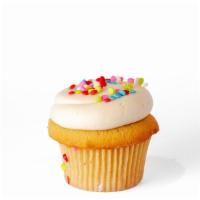 Vanilla Vanilla · Vanilla cupcake frosted with vanilla buttercream icing topped with confetti sprinkles.