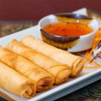 Veggie Spring Roll Appetizer · Four crispy rolls sautéed with bean thread noodles and mixed vegetables. Served with homemad...