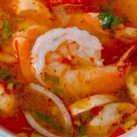 S 13. Tom Yum Goong (Lemongrass Shrimp Soup) · A classic Thai hot and sour soup with a blend of lemongrass, shrimps, mushrooms, tomatoes, r...