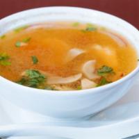 S 14. Tom Yum Gai : (Chicken Soup) · Thai hot and sour soup with chicken, lemongrass, mushroom, tomatoes, and onions in a spicy s...