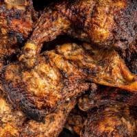 Jerk Chicken · Choose of Two Sides
*Rice & Peas
*White Rice
*Steamed Cabbage 
*Mac & Cheese
* Plantain