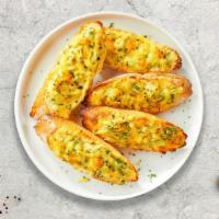 Geeky Garlic Bread With Cheese · (Vegetarian) Housemade bread toasted and garnished with butter, garlic, mozzarella cheese, a...