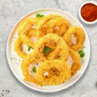 Crispy Onion Rings · (Vegetarian) Sliced onions dipped in a light batter and fried until crispy and golden brown.