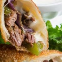 Freddys Philly Cheese Steak Egg Rolls · Philly Cheesesteak Egg Rolls loaded with thinly sliced marinated steak, bell peppers, onions...