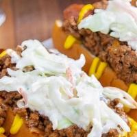 ( New ) Freddys Carolina Slaw Dogs · Freddy's Carolina-Style Slaw Dogs are topped with mustard, homemade Chicken chili, and a coo...