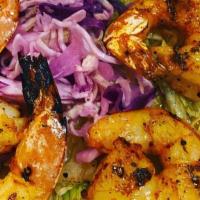 Habanero Grilled Shrimp · Dressed with Habanero Pepper, Agave Nectar, Fresh Lime Juice and Served with Mexican Slaw.