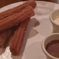 Churros · Churros filled with Mexican Style Caramel and sprinkled Cinnamon and Sugar.  Served with a s...