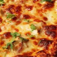 Med Bbq Pizza · Grilled marinated chicken in tangy bbq sauce and mozzarella cheese.