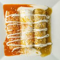 Enchiladas Norte Sur · Three enchiladas one chicken, one beef and one cheese topped with green, red and white sauce...