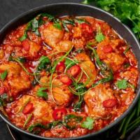 Indian Chili Chicken · Freshly sautéed cubes of chicken breast with soy sauce, onions, green chilies, herbs and var...