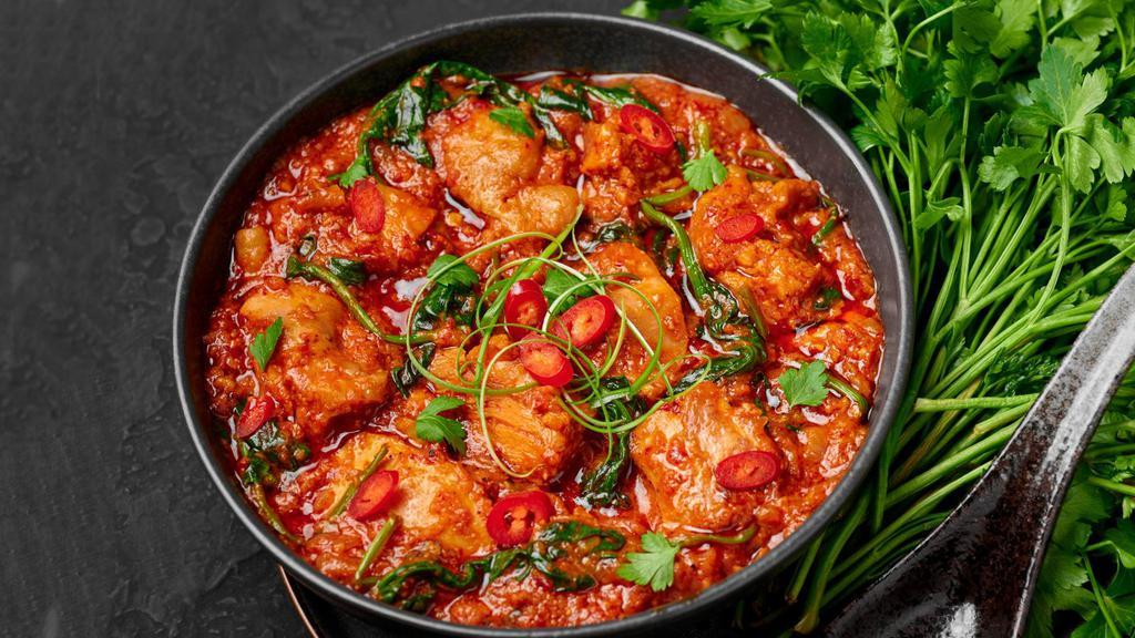 Indian Chili Chicken · Freshly sautéed cubes of chicken breast with soy sauce, onions, green chilies, herbs and various spices.