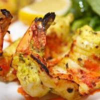 Tandoori Shrimp · Freshly prepared tender shrimp, marinated in freshly ground Indian spices, further BBQ in a ...